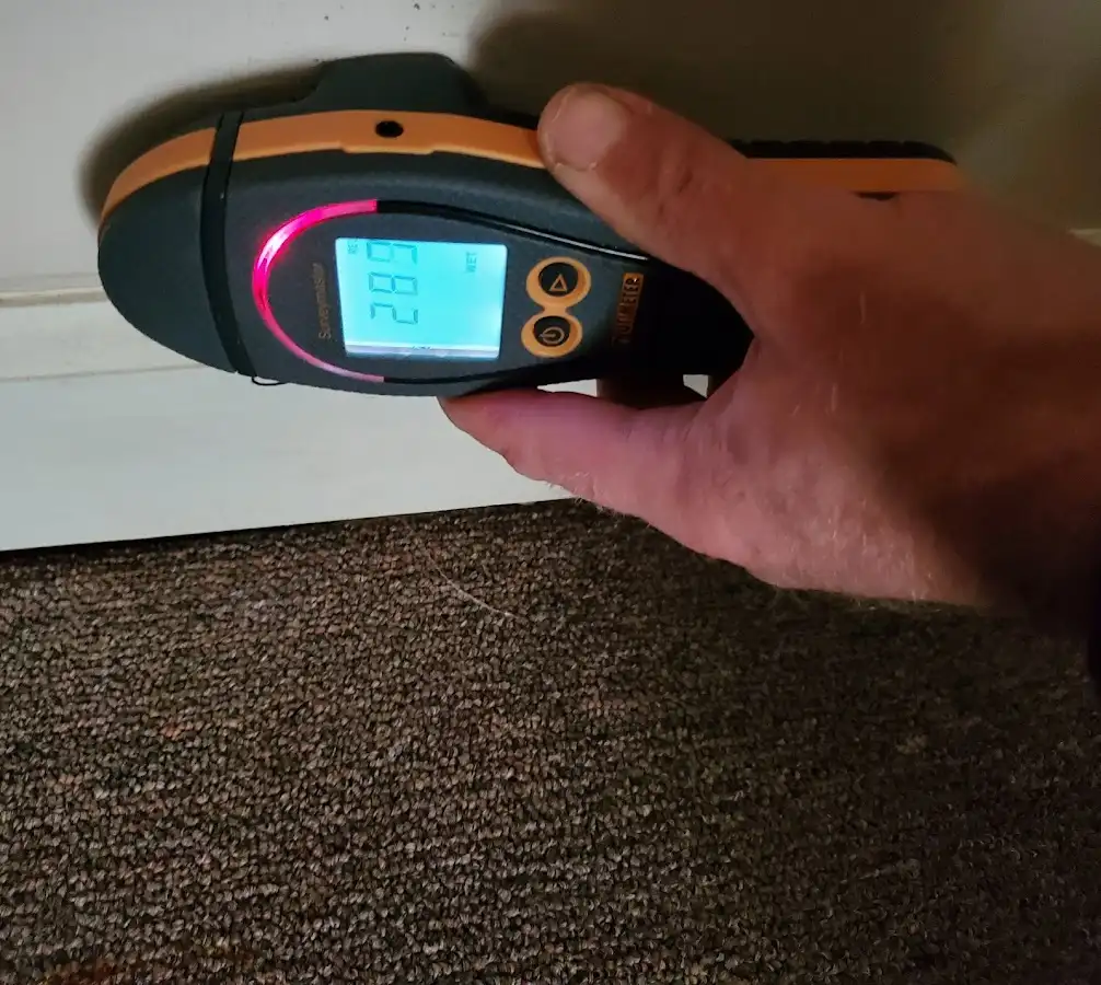 Moisture detection at baseboard during Burst Pipe Cleanup in Snellville